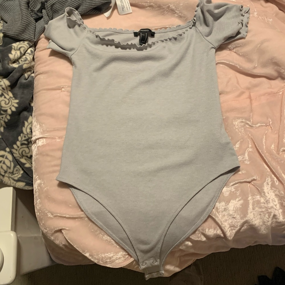 Never worn body suit